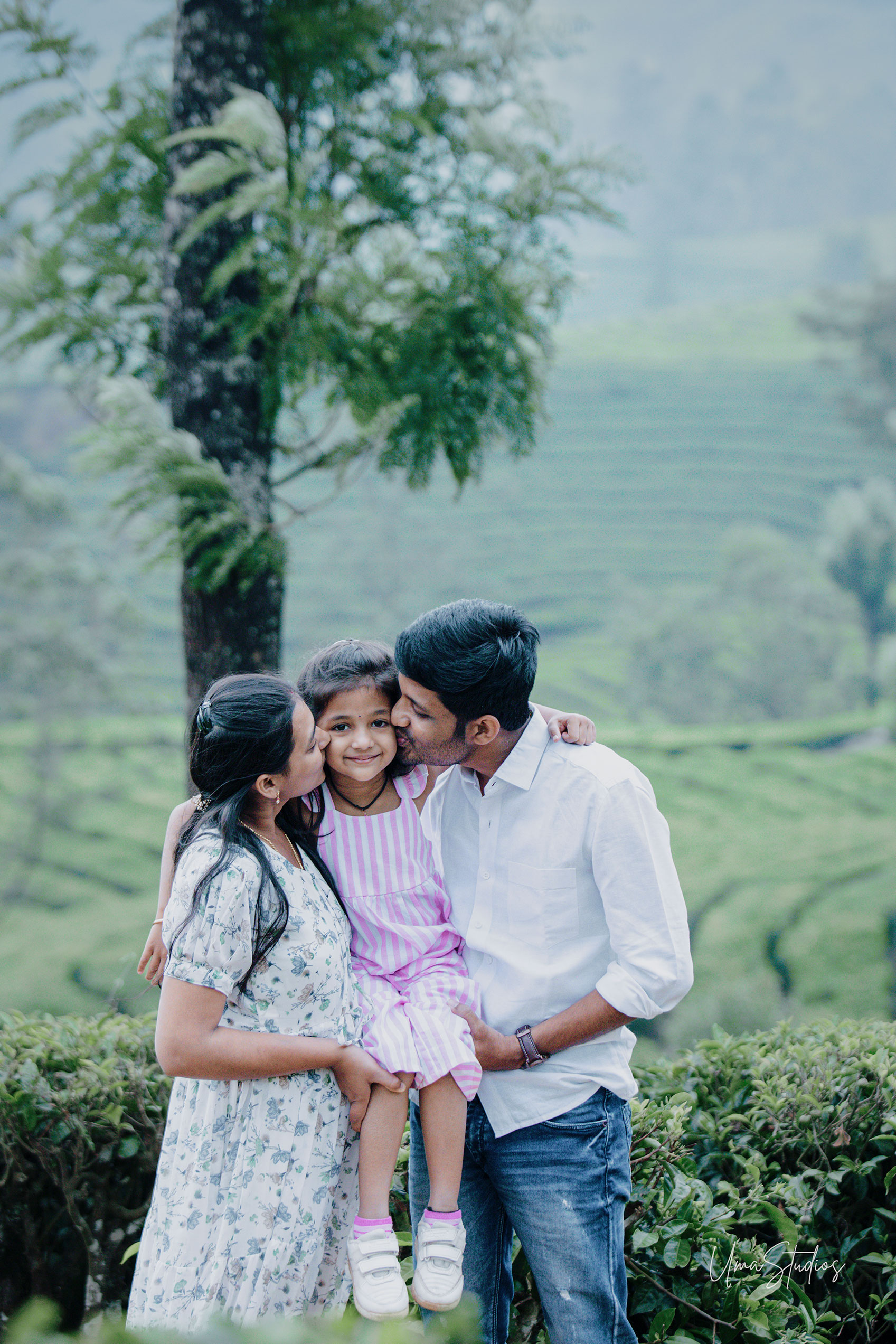 "Candid family photography in scenic Munnar tea gardens during golden hour"