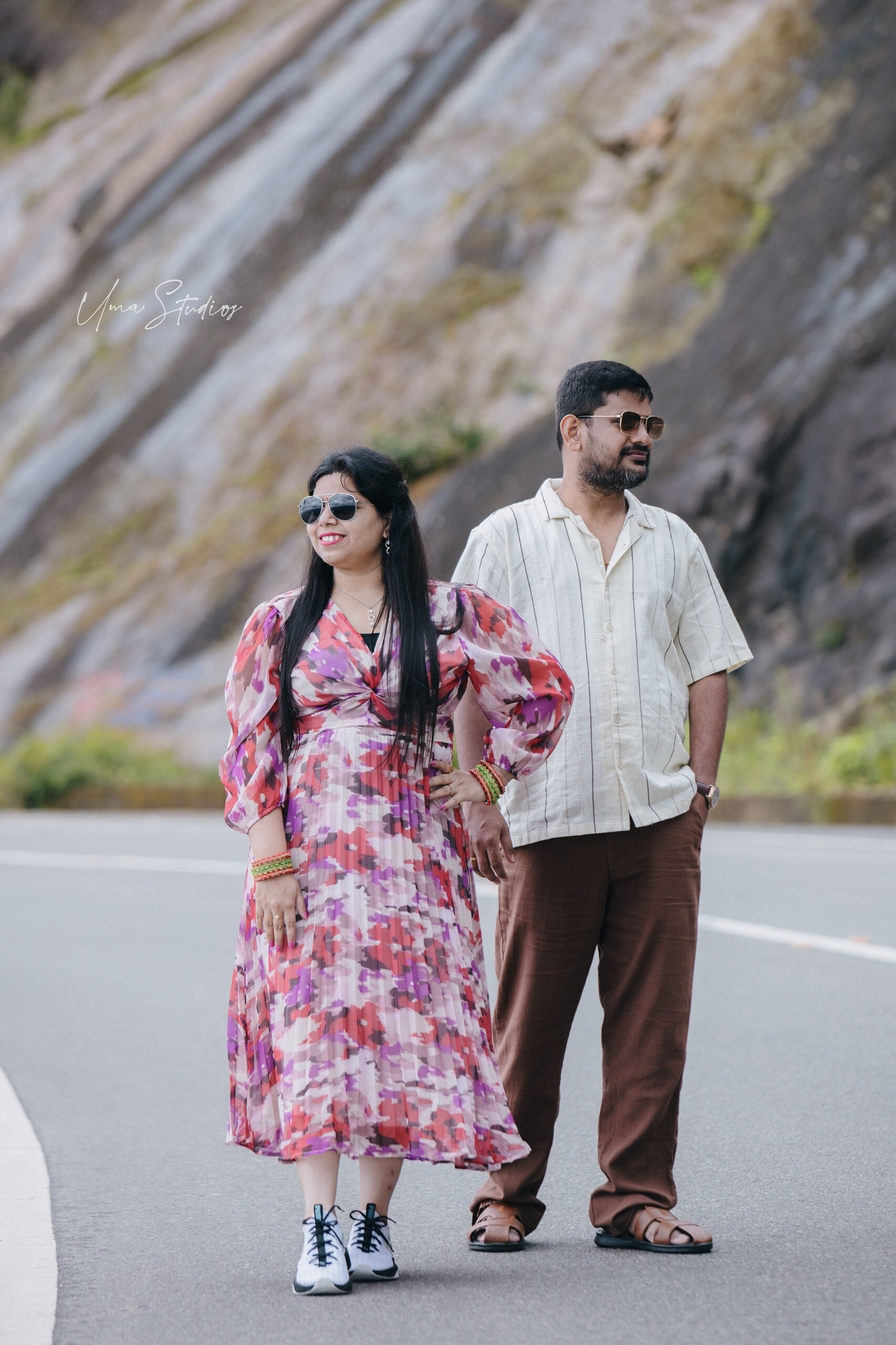 "Couple posing naturally in casual wear amidst Munnar’s lush landscapes"