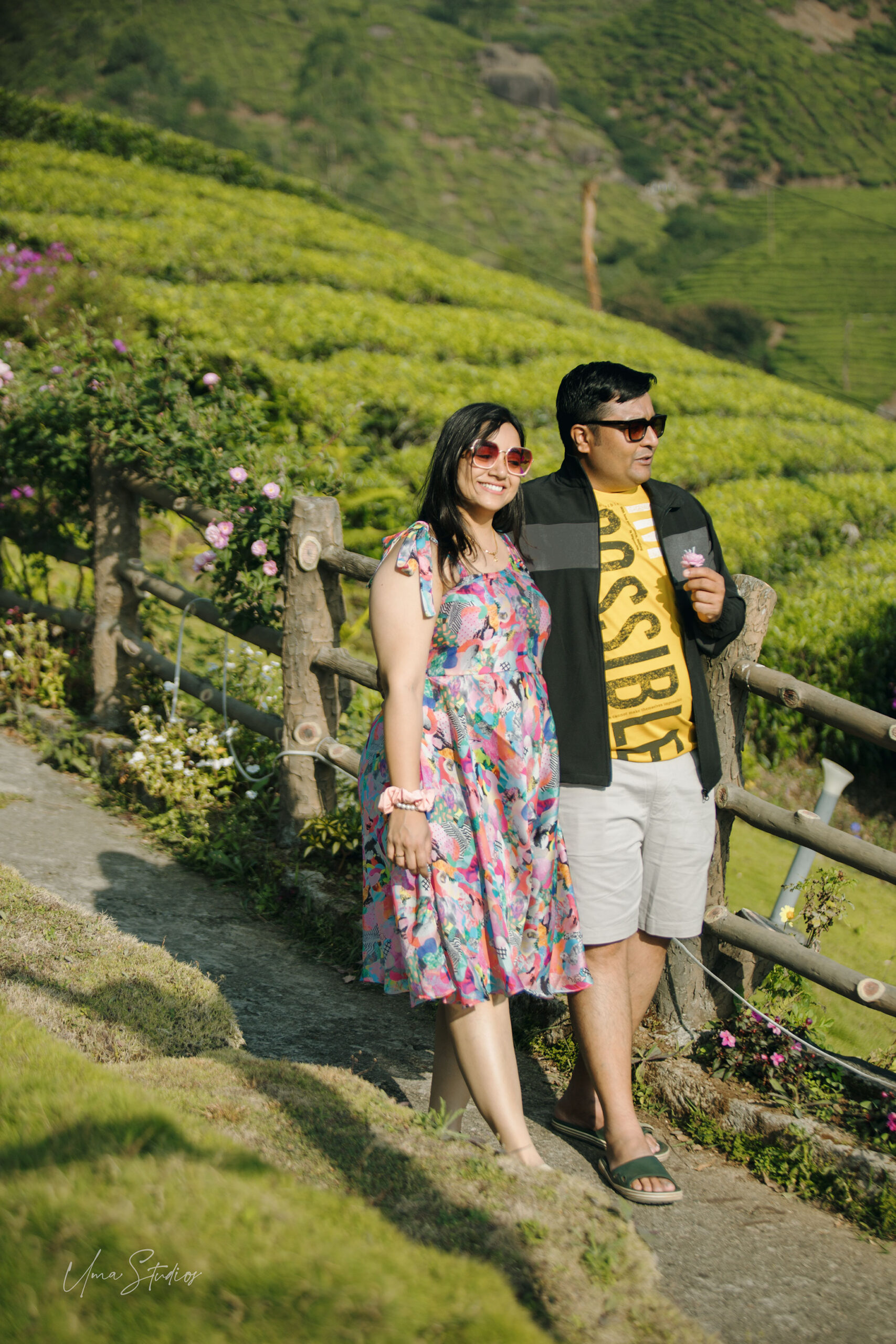 "Romantic couple photoshoot in Munnar tea garden during golden hour with cinematic vibes"