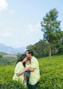 family photography in Munnar tea plantation with kids and parents natural light