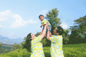 candid family photoshoot in Munnar tea garden Kerala vacation photography